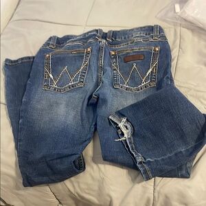 Wrangler Blue Boot Cut Jeans with Distressed Denim